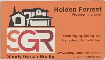 Orange Sandy Garcia Realty business card for Holden Forrest, President and Owner