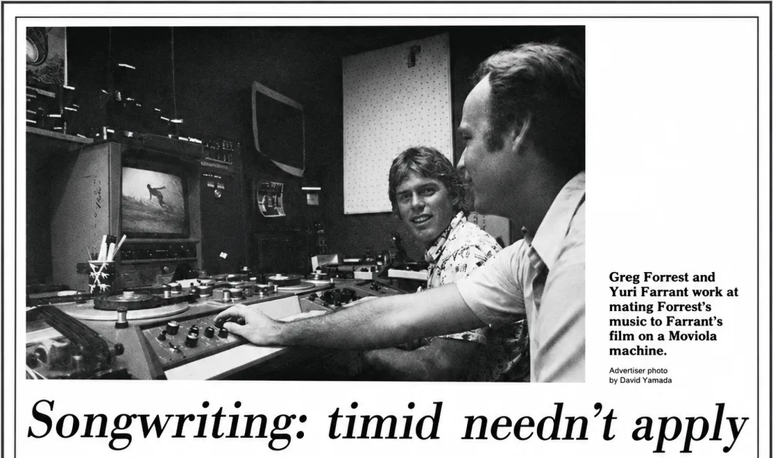 Composer and filmmaker at a film-editing machine, with the original photographer credit